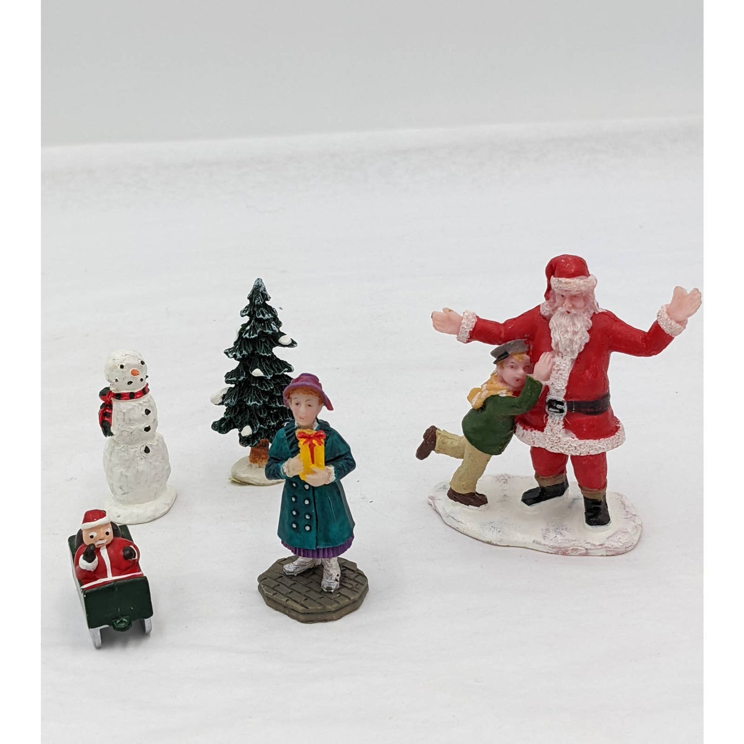 Lemax Christmas Figurines Hugging Santa Claus Tree