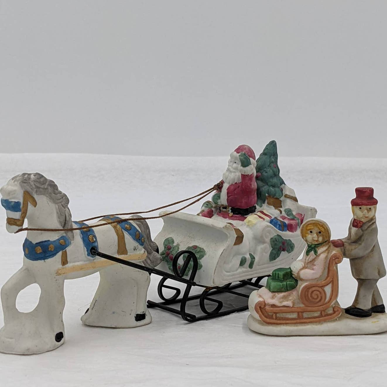 Set of 2 Christmas Figurines Waving Santa Present Carriage Horse