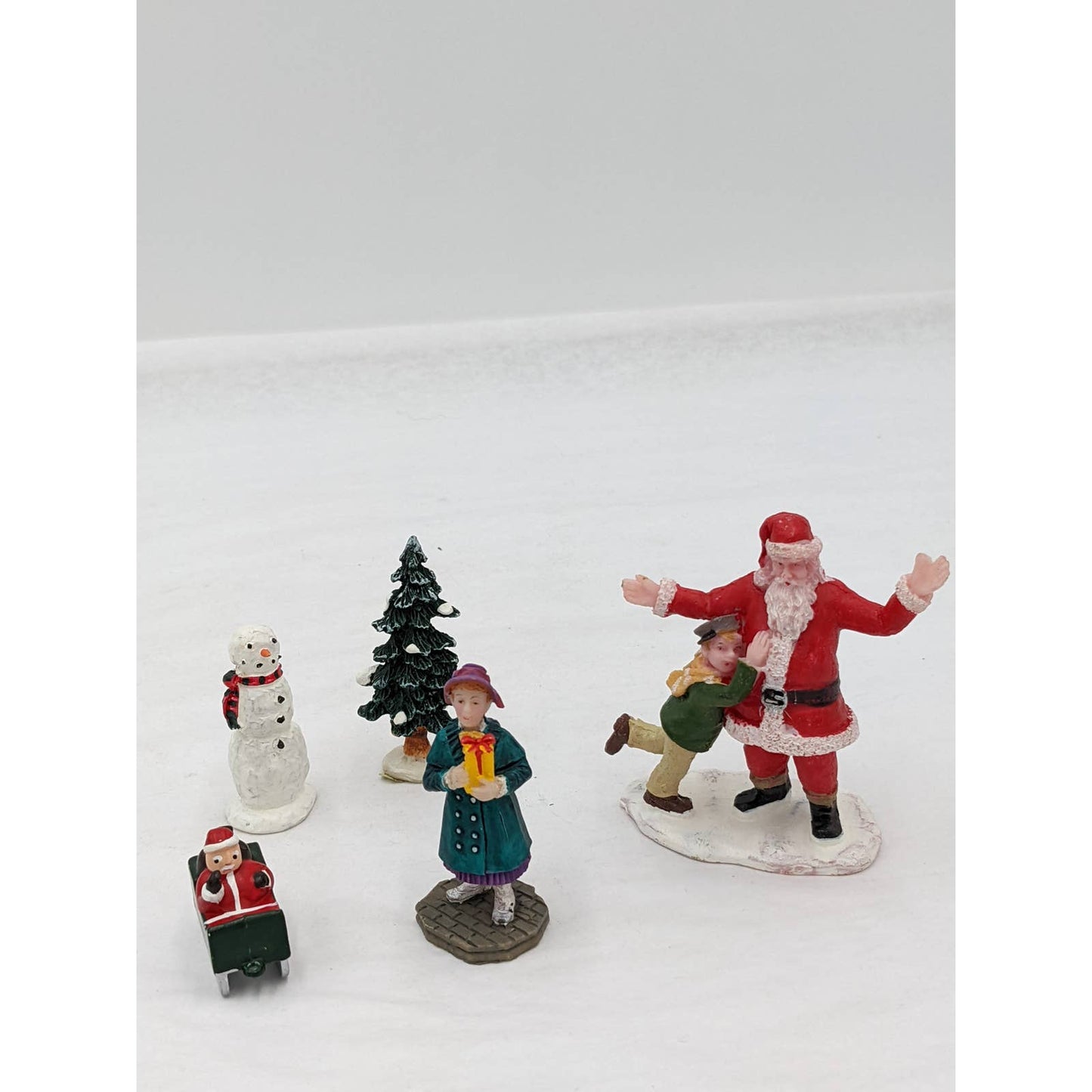 Lemax Christmas Figurines Hugging Santa Claus Tree