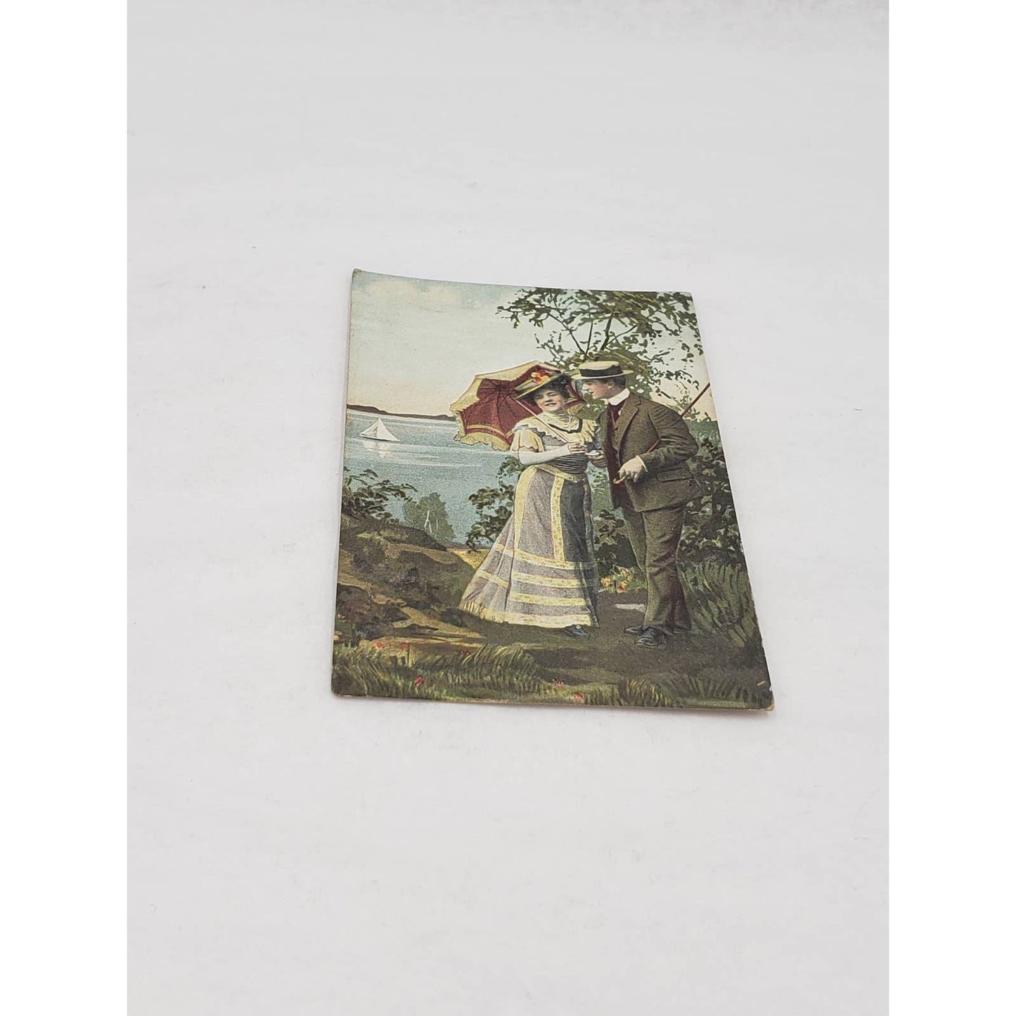 Early 1900s Romance Antique Postcard Stock Photo Couple Stroll Umbrella Romantic